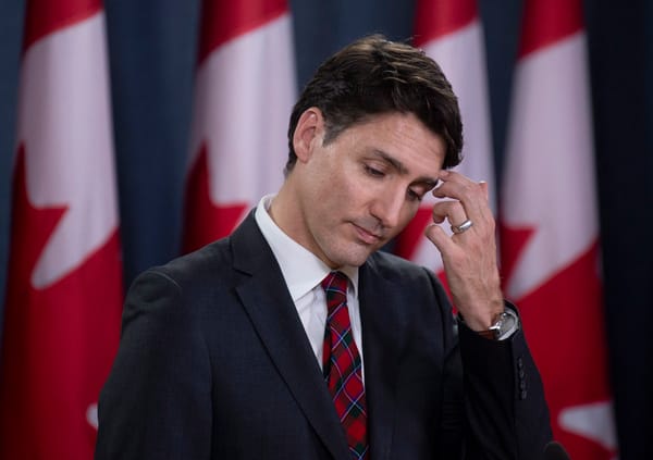 Justin Trudeau scratching his head.